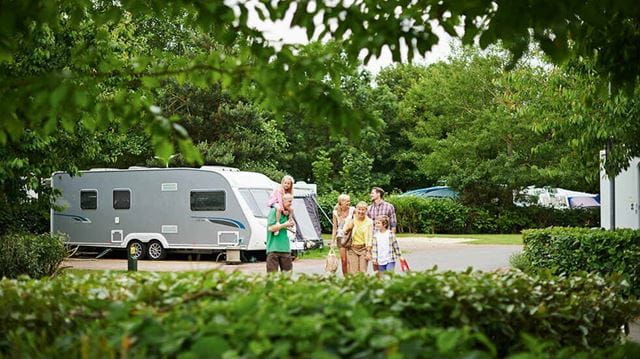 Haven holiday parks: family on walk around park